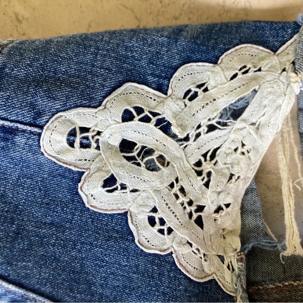 Free People Distressed Blue Denim Shorts with Lace Accents
